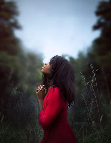 Woman Praying by Diana Simumpande
