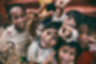 Young impoverished children smiling and laughing