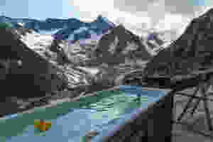 Ice bath with snowy mountains in the background