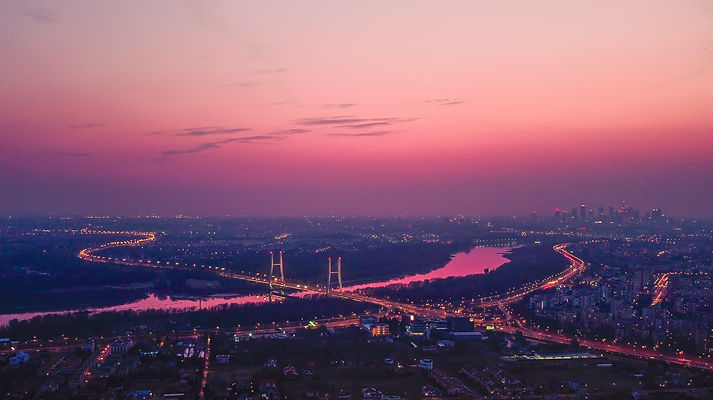 View of Warsaw, the capital city of Poland, illustrating the urban landscape and modern architecture, symbolizing the progressive environment for crypto businesses in relation to obtaining a Crypto License in Poland.