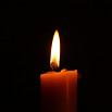 Candle in dark.