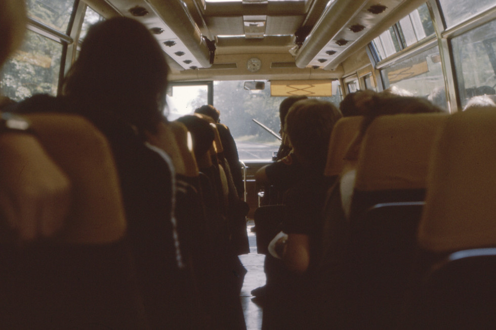 Passengers on a coach journey.