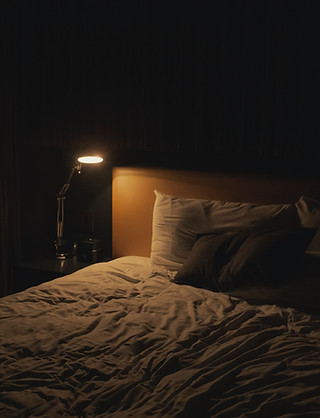 Bed, dim lighting