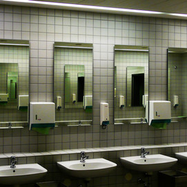 public bathroom sinks and mirrors