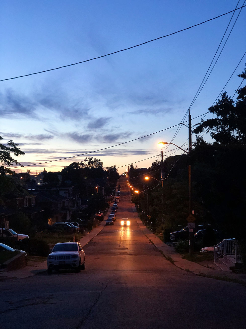 Dark city street at night