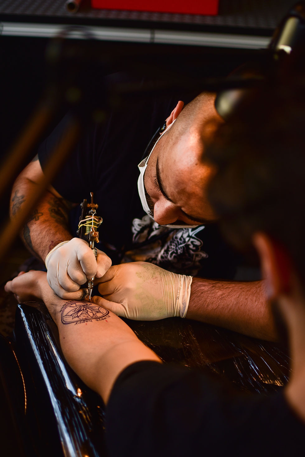 making tattoo on a hand