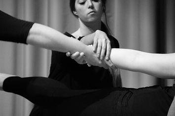 Dancers clasping hands.