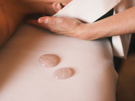 Swedish vs deep tissue massage session showing therapist working on neck and scalp muscles