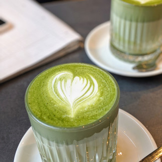 Hot matcha latte with latte art