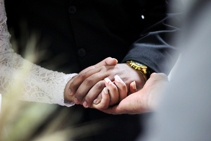 Entwined Wedding Videography Bride and Groom Hold Hands