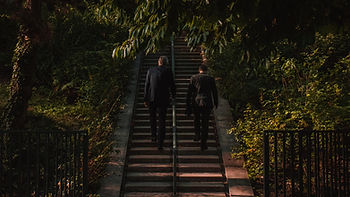 Men going up the stairs.