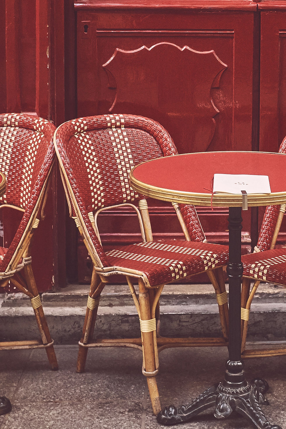 Red cafe tables and chairs