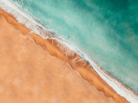 sandy beach and sea. Image by Barna Bartis