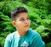 An elementary age boy finding relief following an individual psychotherapy session at Forward focus Counseling Center.