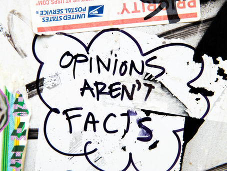Graffiti-laden wall with bold text reading "OPINIONS AREN'T FACTS" in a thought bubble. Vibrant colors and chaotic patterns. Cognitive Dissonance.