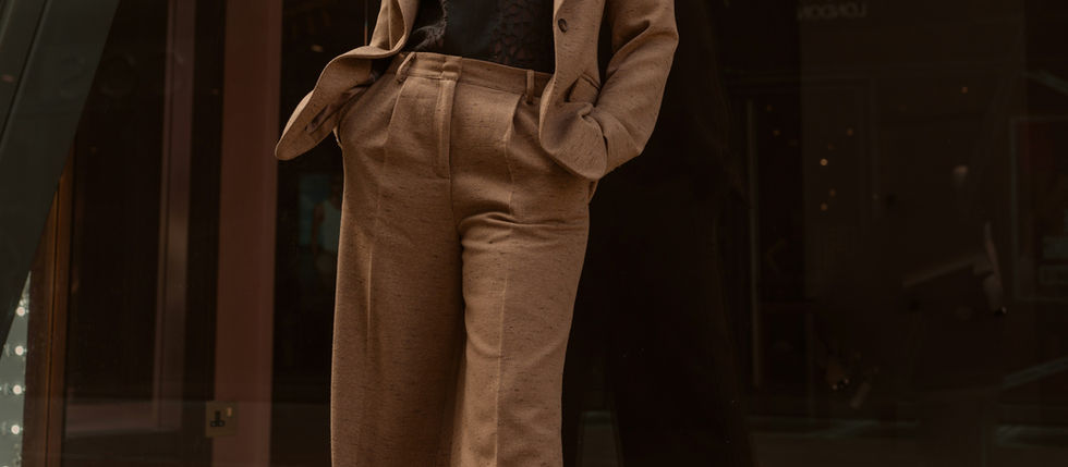 women in a linen suit