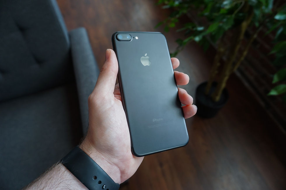 Hand holding a black iPhone – trusted iPhone repairs and diagnostics in Kent
