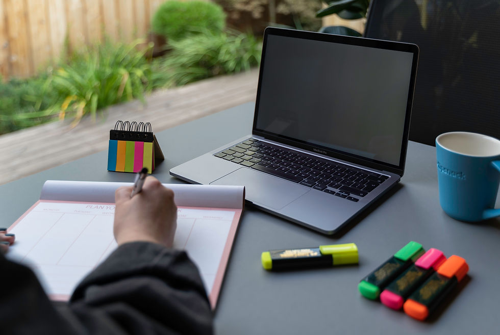 a laptop notebook highlighter or cup