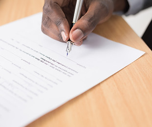 Man signing contract