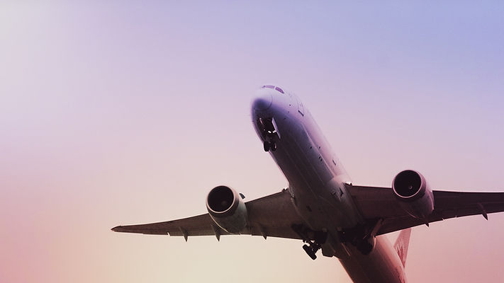 Airplane flying in the sky from Belize International Airport