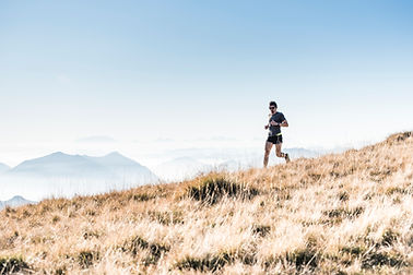 man running in the mountains