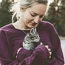 Happy owner and cat