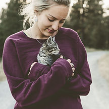 Pet Sitter Holding a Cat