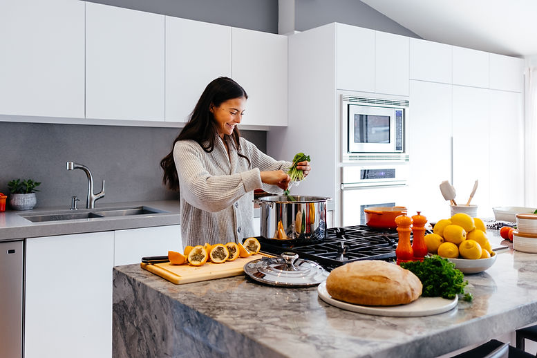 Woman cooking cancer fighting foods