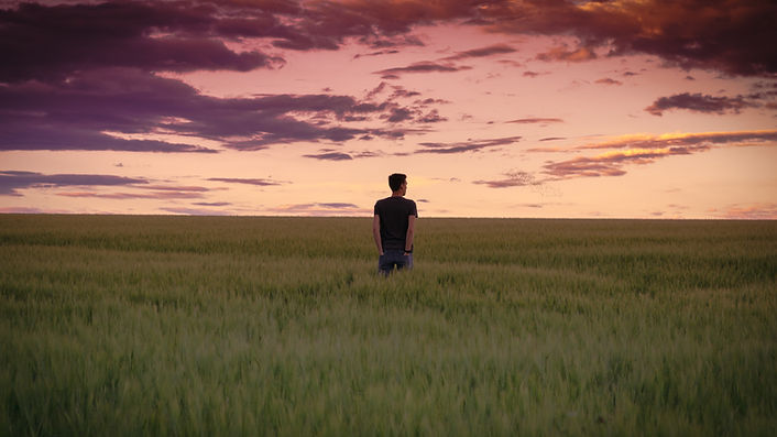 Man Staring Into Distance