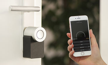cell phone: Hand holding a cell phone to call for a free estimate