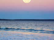 Full moon ritual by the ocean