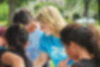 Woman and teens volunteering