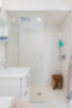 White bathroom with glass shower