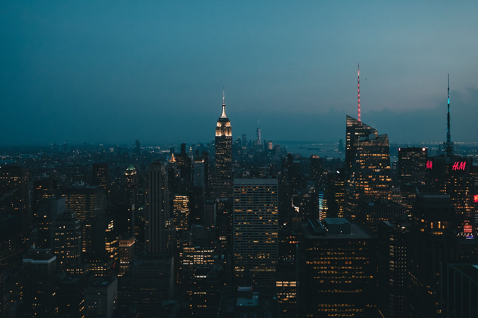 New York City skyline at night with the Empire State Building — LandLuxeWorld luxury technology