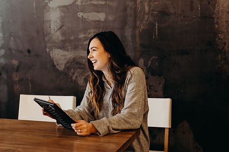 Happy woman having career and wellbeing coaching session