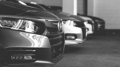 Cars parked at a dealership; Auto dealerships that are worried about conversational AI security should look to STELLA AI for customer engagement solutions.