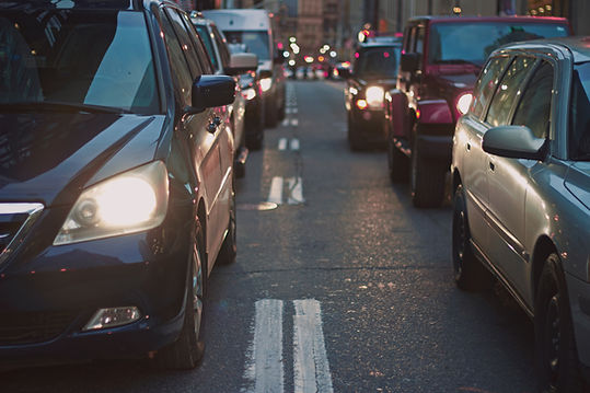 Close-up of cars driving at night