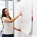 A women doing presentation, which represents the HRDF Claimable program Effective Presentation