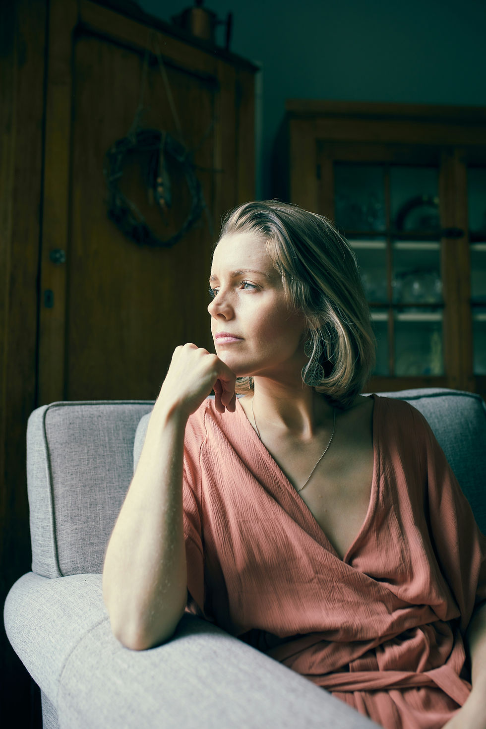 Woman resting, feeling empty and confused