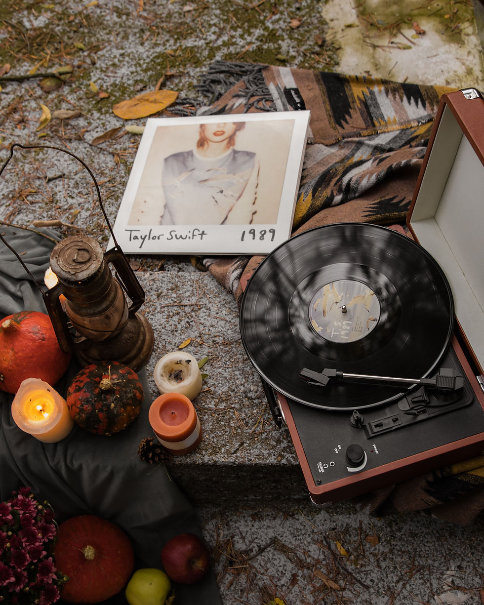 Fall decor and cover photo so Taylor Swift's 1989 album with a record player