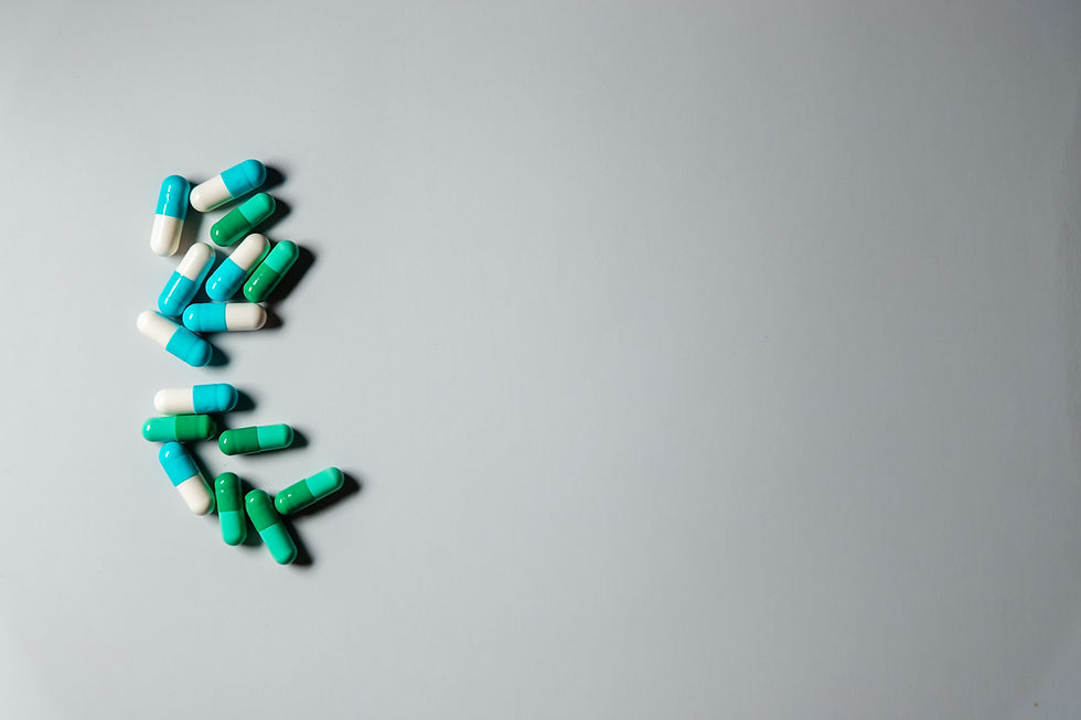 bright green pills on a flat surface