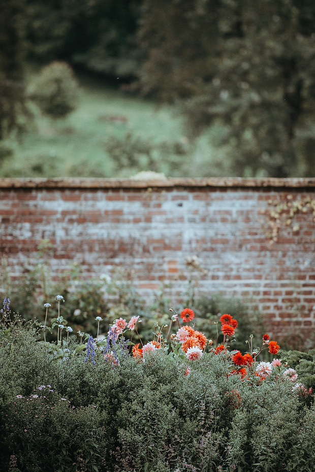 landscape design flowers softscaping hardscaping brick retaining wall