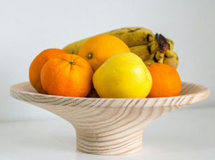 Bowl of fruit, including oranges, apples and bananas.