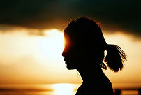 Woman at sunset