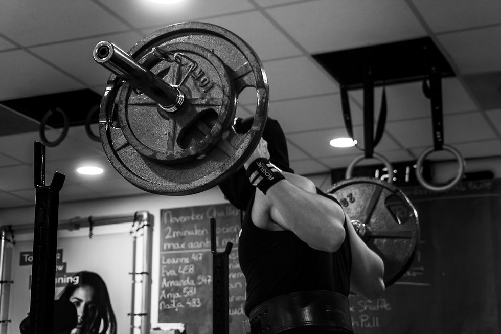 Actor lifting weights to stay in good shape.