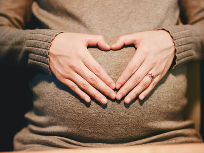 A mother's love grows quietly, nurturing the bond even before birth.