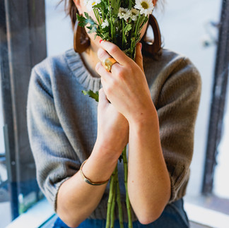 Boost mood with flowers (woman bouquet).