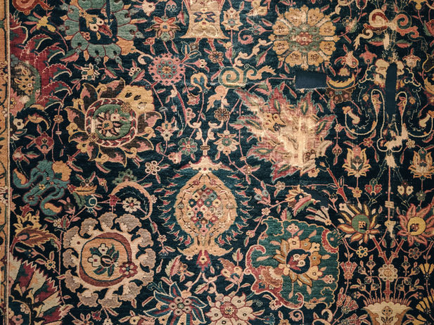 Cleaned patterned handmade rug. 