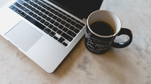 computer and coffee cup - order your coffee online