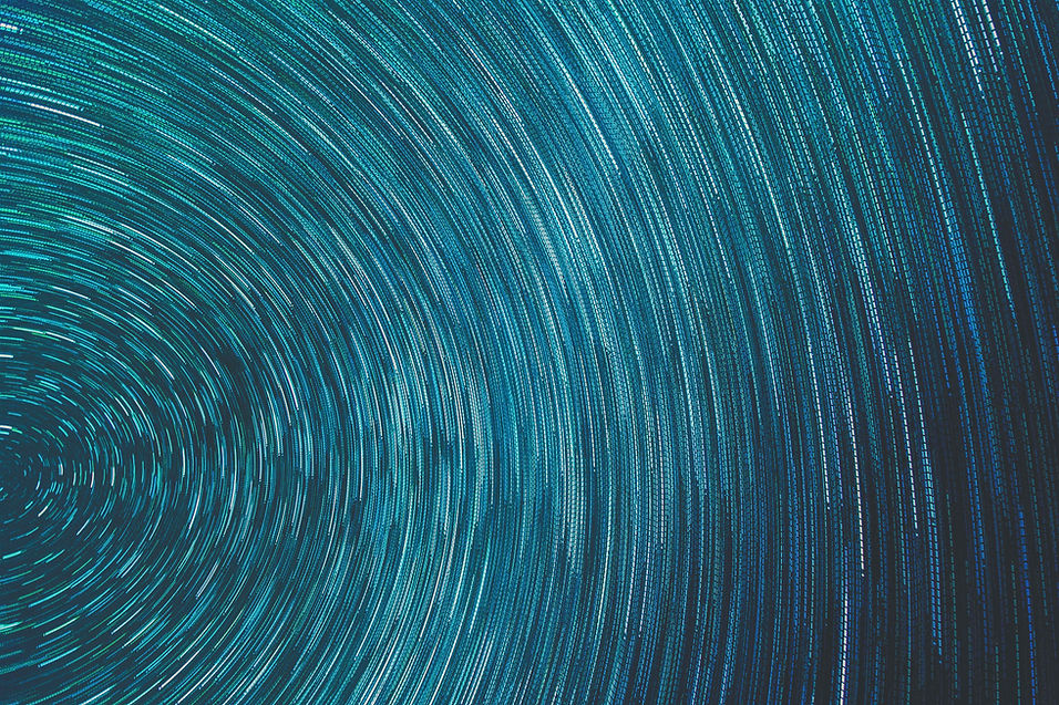 Spiralling blue energy field, reflecting the interconnected fabric of creation and universal oneness